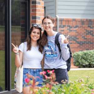 Two Students Smiling